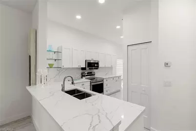 101 Amblewood Ln #1-104, Naples, FL 34105 - Photo 13