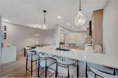 7671 Pebble Creek Cir #303, Naples, FL 34108 - Photo 9