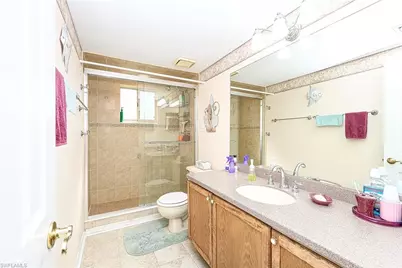 586 Beachwalk Cir #O206, Naples, FL 34108 - Photo 11