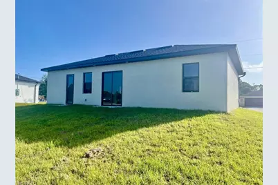 56 Floyd Ave S, Lehigh Acres, FL 33976 - Photo 21