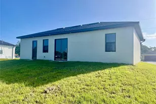 56 Floyd Ave S, Lehigh Acres, FL 33976 - Photo 21