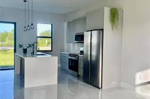 56 Floyd Ave S, Lehigh Acres, FL 33976 - Photo 3