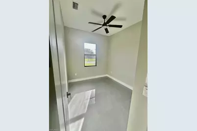 56 Floyd Ave S, Lehigh Acres, FL 33976 - Photo 13