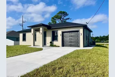 56 Floyd Ave S, Lehigh Acres, FL 33976 - Photo 1