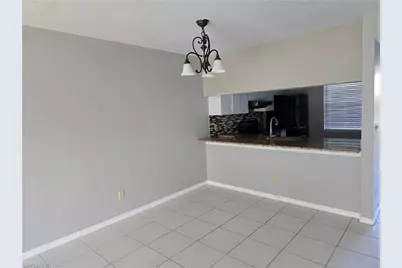 2660 Kings Lake Blvd #7-103, Naples, FL 34112 - Photo 1