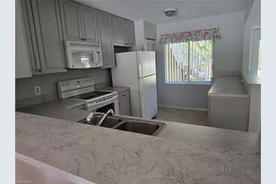 5622 Woodmere Lake Cir #B102, Naples, FL 34112 - Photo 3