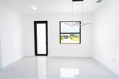 311 Ranier Ave, Lehigh Acres, FL 33974 - Photo 11