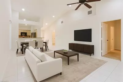736 Wiggins Lake Dr #202, Naples, FL 34110 - Photo 1