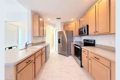 6817 Sterling Greens Dr #8102, Naples, FL 34104 - Photo 9