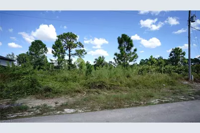 875 Chezy St E, Lehigh Acres, FL 33974 - Photo 1