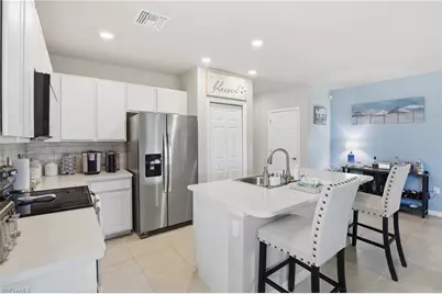 15388 Wildflower Cir, Naples, FL 34119 - Photo 7