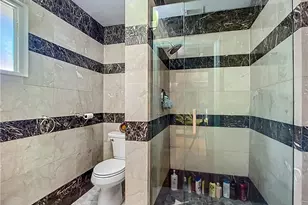 10242 Vanderbilt Dr, Naples, FL 34108 - Photo 39