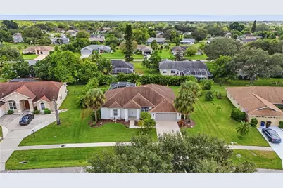 571 Chamonix Ave S, Lehigh Acres, FL 33974 - Photo 3