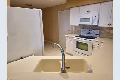 25069 Peacock Ln #101, Naples, FL 34114 - Photo 11
