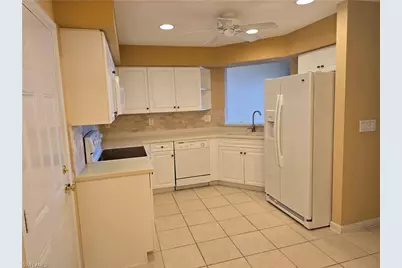 25069 Peacock Ln #101, Naples, FL 34114 - Photo 9