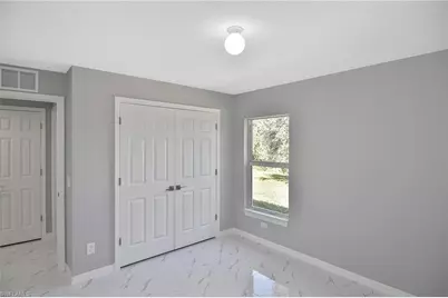 3306 1st St SW, Lehigh Acres, FL 33976 - Photo 17