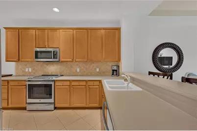 4884 Hampshire Ct #7-303, Naples, FL 34112 - Photo 5