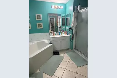 3545 Laurel Greens Ln N #103, Naples, FL 34119 - Photo 21