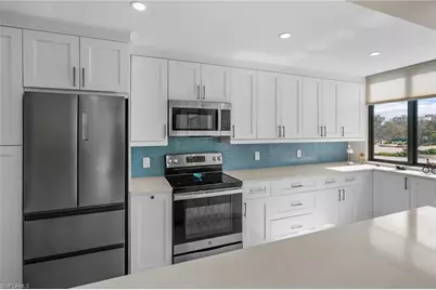 17 Bluebill Ave #101, Naples, FL 34108 - Photo 5