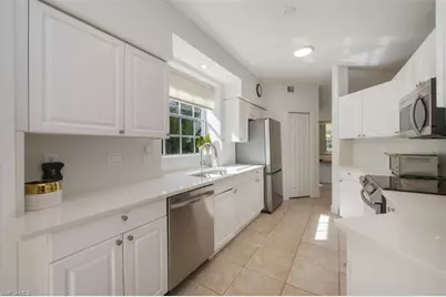 515 Laguna Royale Blvd #102, Naples, FL 34119 - Photo 9