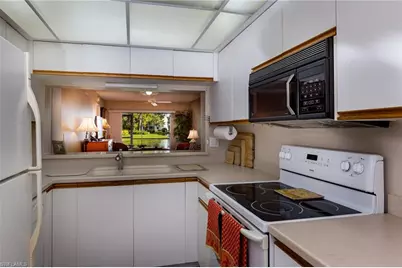 109 Wading Bird Cir #V-104, Naples, FL 34110 - Photo 3