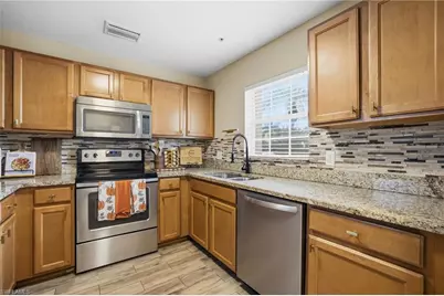 9059 Gervais Cir #1306, Naples, FL 34120 - Photo 1