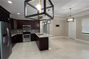 2725 56th Ave NE, Naples, FL 34120 - Photo 11