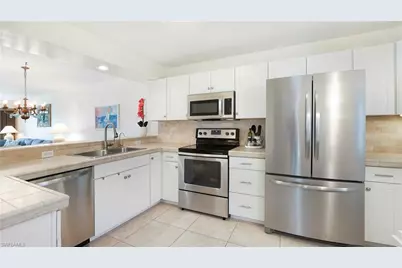 905 New Waterford Dr #101, Naples, FL 34104 - Photo 3