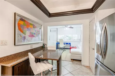 6350 Pelican Bay Blvd #B-105, Naples, FL 34108 - Photo 11