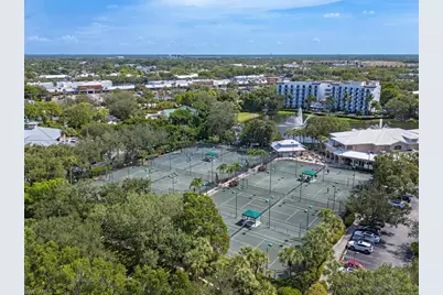 7032 Pelican Bay Blvd #E202, Naples, FL 34108 - Photo 15