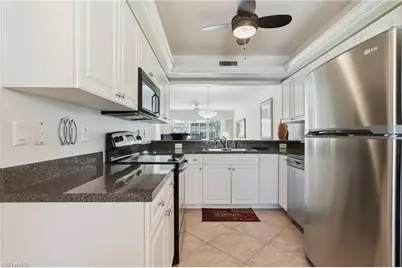 144 Pebble Shores Dr #103, Naples, FL 34110 - Photo 11