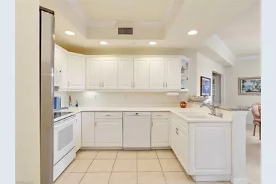 1001 Arbor Lake Dr #105, Naples, FL 34110 - Photo 11