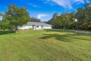 410 11th St NW, Naples, FL 34120 - Photo 1