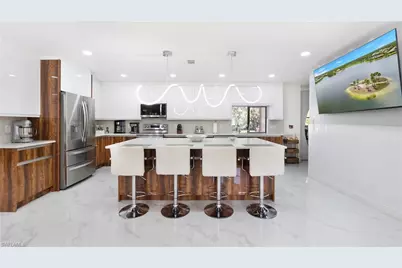 410 11th St NW, Naples, FL 34120 - Photo 23