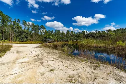 1065 Sanctuary Rd, Naples, FL 34120 - Photo 27