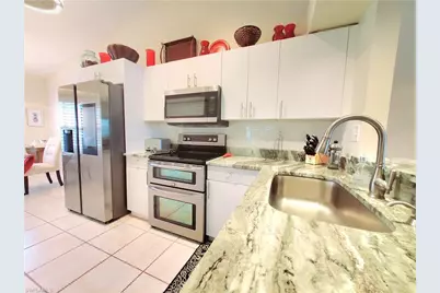 385 Dover Pl #4-402, Naples, FL 34104 - Photo 9