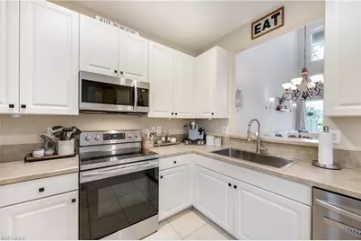 1320 Mariposa Cir #104, Naples, FL 34105 - Photo 3