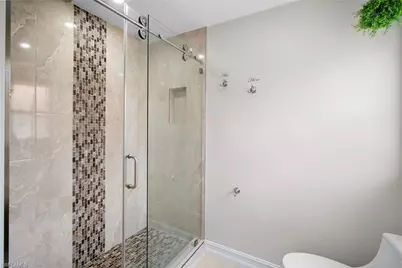 2453 Millcreek Ln #201, Naples, FL 34119 - Photo 13