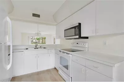 162 Pebble Shores Dr #104, Naples, FL 34110 - Photo 11