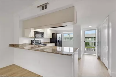 146 Cypress Way E #7, Naples, FL 34110 - Photo 3