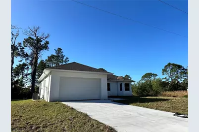 718 Chattman St E, Lehigh Acres, FL 33974 - Photo 1