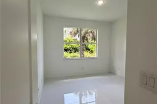 718 Chattman St E, Lehigh Acres, FL 33974 - Photo 21