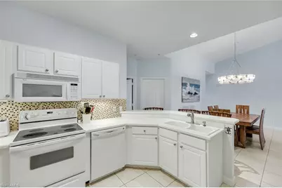 2110 Cay Lagoon Dr #122, Naples, FL 34109 - Photo 7