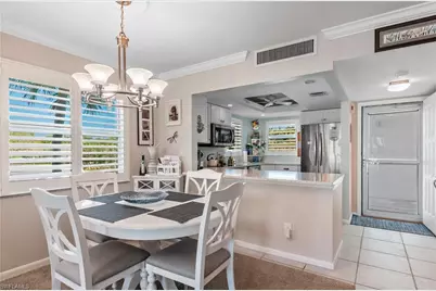 37 High Point Cir E #210, Naples, FL 34103 - Photo 1