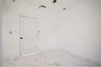 425 Naples Ave S, Lehigh Acres, FL 33974 - Photo 9