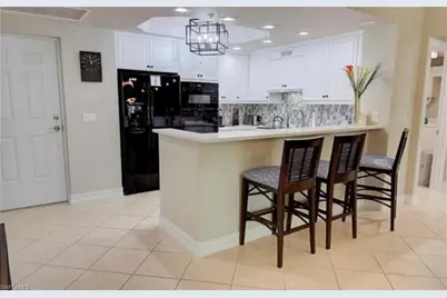 2738 Tiburon Blvd E #B-104, Naples, FL 34109 - Photo 1