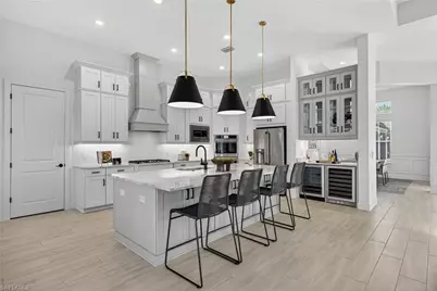 15428 Turin Dr, Naples, FL 34114 - Photo 13