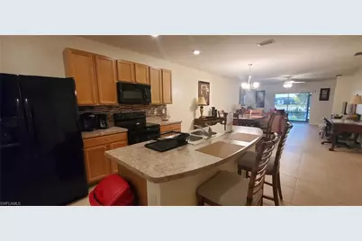 10709 Crossback Ln, Lehigh Acres, FL 33936 - Photo 11