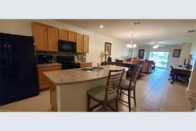 10709 Crossback Ln, Lehigh Acres, FL 33936 - Photo 15