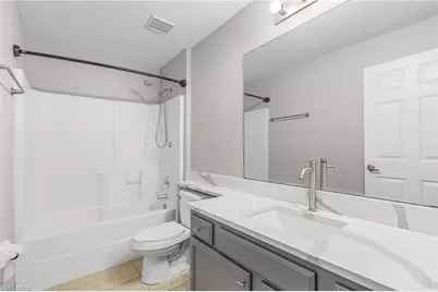 2412 Millie Ave S, Lehigh Acres, FL 33973 - Photo 19